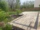 New patio with stone pavers and newly planted trees at 8551 Belle Union Ct, Camby, IN 46113