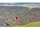 Aerial image of a property marked with a red pin, surrounded by trees and lush greenery at 8968 Old Haggard Rd, Morgantown, IN 46160