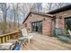 Cozy back deck area with outdoor furniture, perfect for enjoying the surrounding nature at 8968 Old Haggard Rd, Morgantown, IN 46160