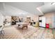 Finished basement with wood burning fireplace, kitchenette and pool table offering space for relaxing and hobbies at 8968 Old Haggard Rd, Morgantown, IN 46160