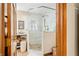 Bright bathroom featuring granite countertops, a glass shower, and tile flooring at 8968 Old Haggard Rd, Morgantown, IN 46160