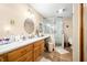 Bathroom features granite countertops, wooden cabinets, and a glass enclosed shower at 8968 Old Haggard Rd, Morgantown, IN 46160