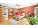 Comfortable bedroom with wood floors, decorative accents, and a view through mirrored closet doors at 8968 Old Haggard Rd, Morgantown, IN 46160