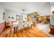 Spacious dining room with seating for eight showcases hardwood floors and lots of natural light at 8968 Old Haggard Rd, Morgantown, IN 46160
