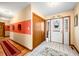 Welcoming foyer with decorative accents, tile flooring, and wood accents at 8968 Old Haggard Rd, Morgantown, IN 46160