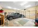 Spacious garage featuring a gray truck, ample lighting, and open garage door at 8968 Old Haggard Rd, Morgantown, IN 46160