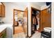 Inviting hallway featuring convenient closet storage and a glimpse into the cozy living room at 8968 Old Haggard Rd, Morgantown, IN 46160