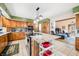 Open-concept kitchen boasts an island with granite counters, stainless appliances, and a seamless transition to the living area at 8968 Old Haggard Rd, Morgantown, IN 46160