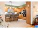 Traditional kitchen with a center island, breakfast bar, and ample cabinet space at 8968 Old Haggard Rd, Morgantown, IN 46160