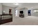 Finished basement featuring a bed and a TV, offering a versatile space for recreation and relaxation at 9253 Windrift Way, Zionsville, IN 46077