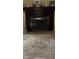 A dark brown fireplace and tan carpet at 930 N Ritter Ave, Indianapolis, IN 46219