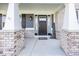 Charming covered front porch with stylish decor at 10027 Landis Blvd, Fishers, IN 46040
