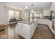 Open kitchen featuring a large island and stainless steel appliances at 10027 Landis Blvd, Fishers, IN 46040