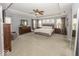 Expansive main bedroom with tray ceilings, plush carpet, and ample natural light from multiple windows at 10027 Landis Blvd, Fishers, IN 46040