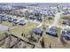 Aerial view of a home with a large yard, mature trees, and neighborhood surroundings at 10212 Ironway Dr, Indianapolis, IN 46239