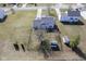 Aerial view of a backyard with two storage sheds and partially bare tree at 10212 Ironway Dr, Indianapolis, IN 46239