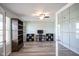 A well-lit office space with laminate flooring and modern shelving at 10212 Ironway Dr, Indianapolis, IN 46239