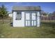 Backyard shed with white and blue trim at 10212 Ironway Dr, Indianapolis, IN 46239