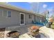 Backyard patio with sitting area, fire pit, and exterior view of the home at 10427 N Delaware St, Carmel, IN 46280