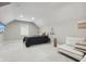 Tranquil bedroom featuring soft carpeting, modern furniture, and plenty of natural light at 10725 Grindstone Dr, Fishers, IN 46037