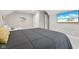 Comfortable bedroom featuring plush carpeting, modern bed, and plenty of natural light at 10725 Grindstone Dr, Fishers, IN 46037
