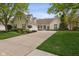 Charming two-story home with a well-manicured lawn and three car attached garage at 10725 Grindstone Dr, Fishers, IN 46037