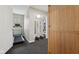 Bright home gym featuring modern exercise equipment and a mirrored wall, perfect for workouts at 10725 Grindstone Dr, Fishers, IN 46037