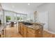 Gourmet kitchen with granite countertops, gas range, and an open layout that connects to the breakfast nook at 10725 Grindstone Dr, Fishers, IN 46037