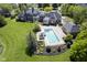 Beautiful aerial shot of an estate featuring a stunning pool and pond area at , Carmel, IN 46032