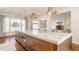 Gourmet kitchen island featuring marble countertops, custom cabinetry and stainless steel microwave at , Carmel, IN 46032