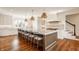 Spacious kitchen with a large island, pendant lights, and modern appliances at , Carmel, IN 46032