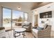 Sunroom featuring comfortable seating and an incredible view of the pool and backyard at , Carmel, IN 46032