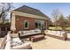 Inviting outdoor patio with comfortable wicker furniture, perfect for entertaining or relaxing at , Carmel, IN 46032