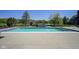 Amazing backyard pool and jacuzzi with a lush yard and view of the house at , Carmel, IN 46032