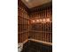 A professionally designed wine cellar features custom racks for optimal storage and temperature control at , Carmel, IN 46032