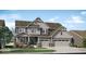 Attractive two-story home featuring a three-car garage and professionally landscaped front yard at 11571 Aubrey Ln, Fishers, IN 46040