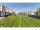 Large, well-manicured backyard offering plenty of space for outdoor activities and recreation at 12929 Shandon Ln, Fishers, IN 46038