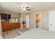A comfortable bedroom includes dressers, a walk-in closet and en-suite bathroom access at 12929 Shandon Ln, Fishers, IN 46038