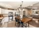 Eat-in kitchen featuring stainless steel appliances, modern lighting, and wood countertops at 12929 Shandon Ln, Fishers, IN 46038