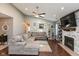 Bright living room with hardwood floors, fireplace, and vaulted ceilings at 12929 Shandon Ln, Fishers, IN 46038