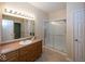 Bathroom with a glass enclosed shower, ample vanity storage, and neutral finishes at 14014 Keams Dr, Fishers, IN 46038