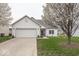 Charming single-Gathering home boasts an attached two-car garage and well-maintained landscaping at 14014 Keams Dr, Fishers, IN 46038