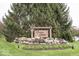 A Canyon Ridge community entrance sign surrounded by beautiful landscaping and trees at 14014 Keams Dr, Fishers, IN 46038