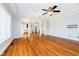 Bright living room with hardwood floors and an open view to the kitchen at 14339 Jeremy Dr, Carmel, IN 46033