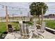 Cozy backyard patio with a seating area perfect for outdoor dining at 1508 N Woodridge Ave, Muncie, IN 47304