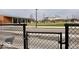 View of a modern academic campus featuring a large building, outdoor spaces, and pedestrian walkways at 1508 N Woodridge Ave, Muncie, IN 47304