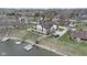 Beautiful lakeside house offering stunning water views and a lush green lawn at 1847 Crystal Bay East Dr, Plainfield, IN 46168