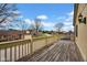 Inviting deck overlooking neighborhood street lined with bare trees at 1847 Crystal Bay East Dr, Plainfield, IN 46168