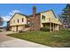 Attractive multi-level home with an attached garage, brick chimney, and a raised outdoor deck at 1847 Crystal Bay East Dr, Plainfield, IN 46168