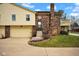 Inviting home features a private entrance, attached garage, and well-manicured front yard at 1847 Crystal Bay East Dr, Plainfield, IN 46168